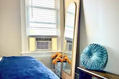 Image de Step into a serene stay where electric charm meets cozy coastal tranquility.