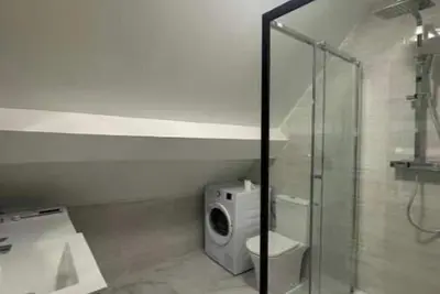 Image de Appartement Moderne proche de disneyland Wifi & Café & Arrivée Autonome - Rdc