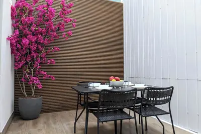 Image de Appartement duplex avec patio à côté de Fira Gran Via