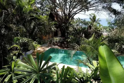 Image de An exclusive jungle hideaway just steps from Plaza and the beach