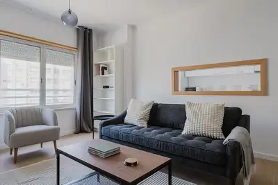 Image de Blueground | Laranjeiras, washer & city view