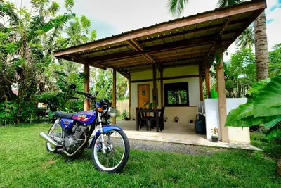 Filipino style cabin in the nature of Albay, surrounded by green volcano hills