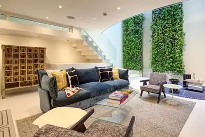 Image de Spacious 4-bedroom house with Ac, fitness room in awesome London central area