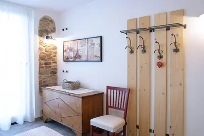Image de Chambre 'Doppia Piano Terra' avec vue sur la montagne et terrasse privée