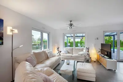 Image de Appartement \"Großzügige Wohnung\" avec piscine partagée, terrasse privée et Wi-Fi