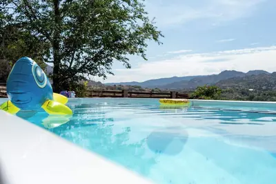 Image de 》3400sqft w/Heated Pool & Hot Tub, Sleeps 18 & Mtn Views