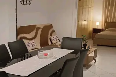 Image de Dimitri's Cosy Home in Nea Ionia with wifi, a/c, kitchen and sunny yard