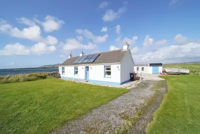 Image de Susan's Beach House Right on the beach, a beautiful cottage + spectacular views