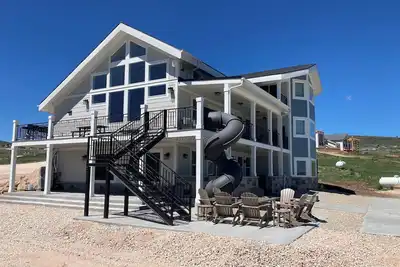 Image de New Listing! Sleeps 33! Private Hot Tub! Ideal Beach Access! Slide! Pickleball!