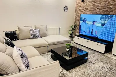 Image de GHome 6 Zimmer(140sqm, Up to 10 people, WiFi, Parking, Workers and Large family)