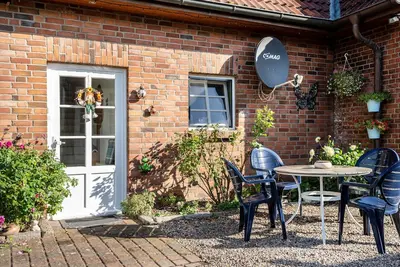 Image de Appartement \"Ferienwohnung Wittensee\" avec terrasse partagée, jardin privé et Wi-Fi
