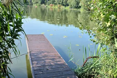 Image de Maison de vacances 'Seeidyll' avec son propre embarcadère et ses rives du lac