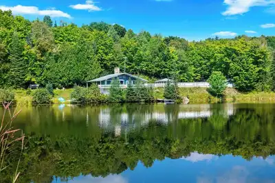 Image de Magnifique Chalet - Bord De Lac Et Piscine