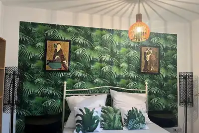 Image de Our 2024 newly built and cozy apartment in vintage-modern style with about 60sqm is at ground level with separate entrance and can accommodate 1-4 people. The fully equipped kitchen with fridge, stove, oven, kettle and coffee machine