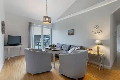 Image de Appartement 'Ferienwohnung Marschblick' avec terrasse privée, jardin partagé et Wi-Fi