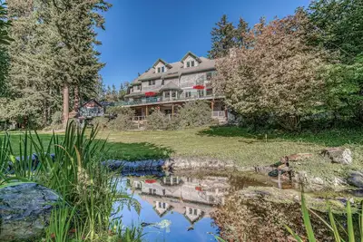 Image de Family friendly water view escape with deck, games and garden views