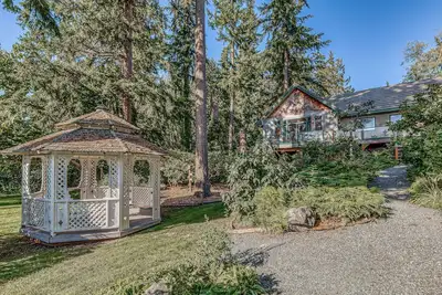 Lower-level suite with deck/veranda, garden views, & foosball