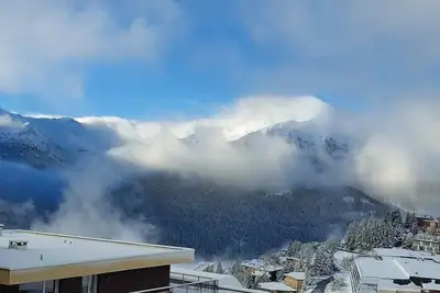 Image de Appartement \"Pieds Des Pistes\" avec vue sur les montagnes, terrasse privée et Wi-Fi
