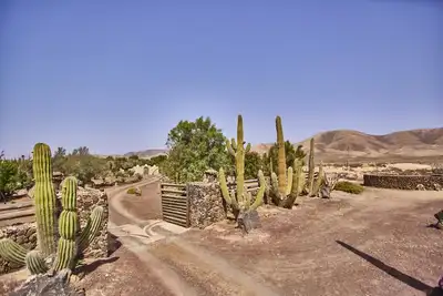 Image de Maison de vacances 'Oasis San Martn El Cotillo' avec vue sur les montagnes, terrasse privée et Wi-Fi