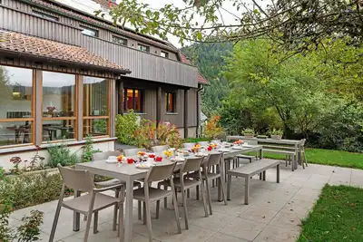 Image de Maison de vacances 'Gruppenhaus Baiersbronn Lug Ins Tal' avec vue sur la montagne, terrasse et Wi-Fi