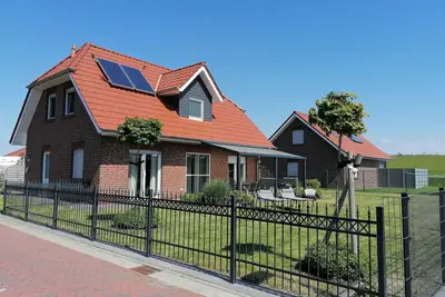 Image de Freistehendes Ferienhaus an der Nordsee Direkt am Deich für bis zu 8 Personen