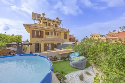 Image de Maison de vacances 'Adosado En Finestrat' avec vue sur les montagnes, Wi-Fi et climatisation