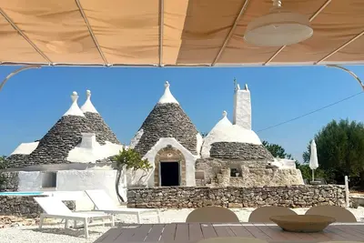 Image de Trulli Pace 1879 - Ancient trulli renovated in an exclusive natural area