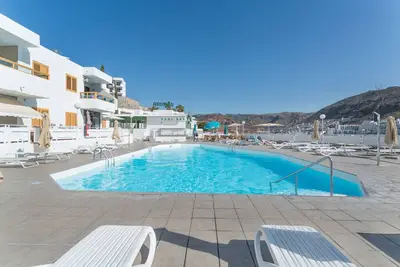 Image de Maison de vacances 'Casa Neale' avec vue sur la mer, piscine partagée et terrasse privée