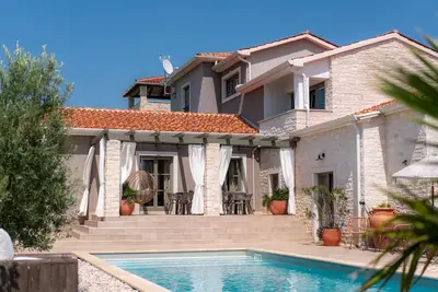 Image de Villa Moonlight 2 for 12 persons near Poreč with private heated pool - 45 m2 & playground