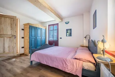 Image de Chambre 'Camera Tripla' avec vue sur les montagnes, jardin commun et balcon