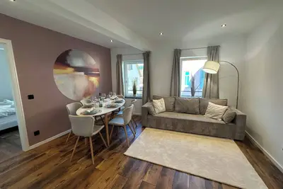 Image de Charmante Ferienwohnung mit GroĂźer Dachterrasse & Wintergarten
