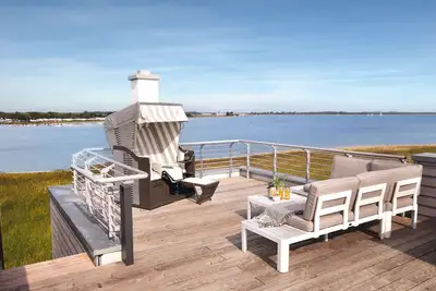 Image de Vacation home \"Meerliebe\" with Baltic Sea and Schlei view - sauna, fireplace & roof terrace