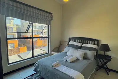 Image de Cozy apartment in welcoming Fourways 1bed wifi 4km to Monte Casino 24/7security