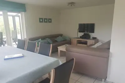 Image de Bungalow côtier avec jardin