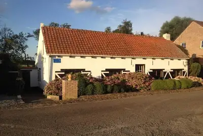 Image de Maison digue près de Breskens avec jardin