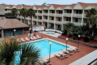 Image de Sj3 Cozy efficiency+pool. Across from the beach