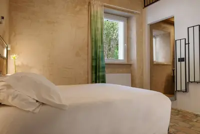 Image de Ognissanti Guesthouse, Marche Region'S Double room with bathroom and a mezzanine with two single beds