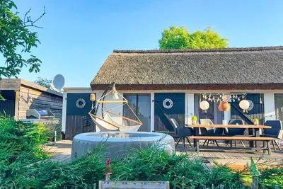 Image de Close to the sea, quiet location, use of swimming pool and sauna - Ferienhaus BĂĽdnerstube