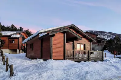 Image de Noël à la neige dans un Chalet de montagne 4 faces en Cerdagne