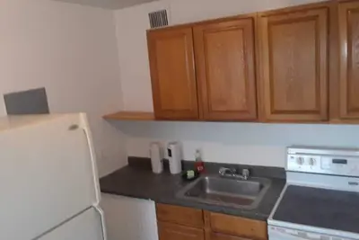Image de Cozy 1-bedroom, 1 shared bathroom, 2 miles from the beach, Wpb Port, Trirail
