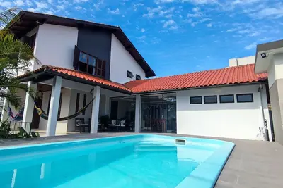 Image de Beautiful house, 4 bedrooms, swimming pool, barbecue - Praia da Daniela - FlorianĂłpolis