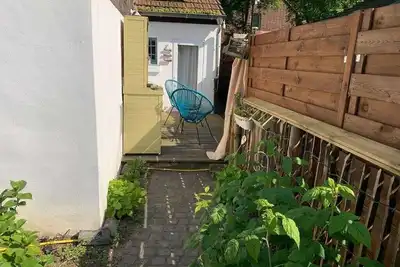 Image de Tiny house-Vue sur Jardin-Salle de bain partagée