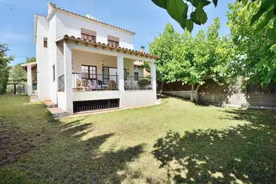 Image de Maison de vacances 'Chalet Independiente Costa Daurada' avec jardin privé, balcon et climatisation