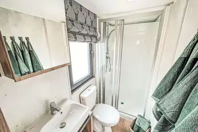 Image de Bel appartement dans une maison de vacances avec climatisation, Tv, terrasse, animaux admis, parking