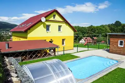 Image de Maison de vacances privée avec Wifi, piscine privée, bain à remous, Tv, patio, parking