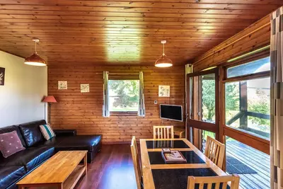 Image de Maison de vacances privée avec Wifi, bain à remous, Tv, patio, vue panoramique, parking