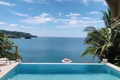 Image de A Luxury Tented Experience with a Saltwater Infinity Pool and Private Beach.