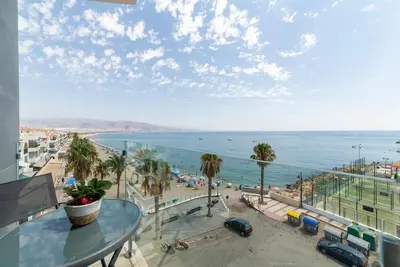 Image de Beachfront apartment, ideal for disconnecting and resting.