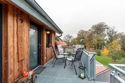 Image de Appartement de vacances 'HĂĽhnernest' avec terrasse commune, jardin commun et Wi-Fi