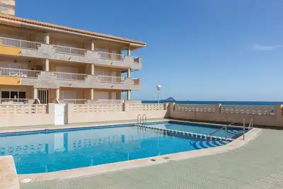 Image de Appartement 'Anadrina' avec vue sur la mer, piscine partagée et Wi-Fi